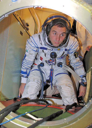 What Knowles did during his summer vacation: drift over Earth in a cramped space shuttle.